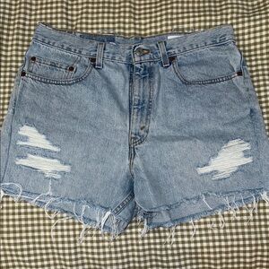 Blue High-Waisted Jean Shorts with Distressed Details